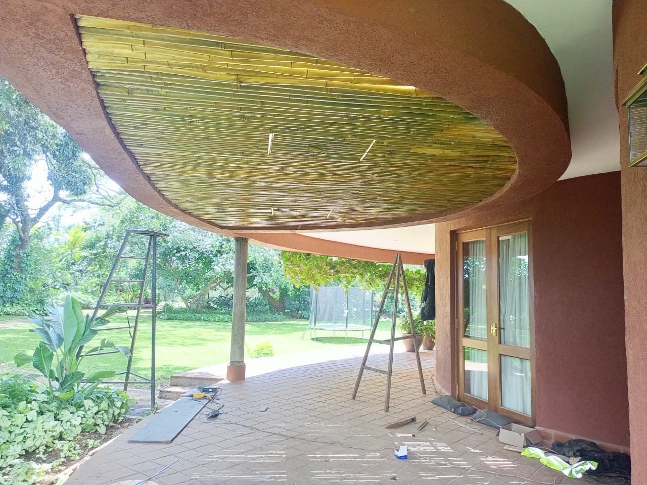 Bespoke bamboo ceiling systems, crafted from premium bamboo full culm poles Location Ngewe House Tatu City Transform your spaces with our bespoke bamboo ceiling systems, crafted from premium bamboo full culm poles and guided by precise species selection for the job. Each installation is thoughtfully designed to deliver structural integrity, durability, and a refined natural aesthetic that complements both modern and organic architecture. We specialize in bespoke & biophilic design, creating ceilings that reconnect people with nature while elevating spatial experience. The result is a warm, calming, and visually striking environment—ideal for residential homes, hospitality spaces, offices, and high-end commercial interiors. Our comprehensive supply and fix services ensure seamless execution from sourcing and treatment to expert installation. With a focus on quality craftsmanship and sustainable design, we deliver bamboo ceiling solutions that are not only beautiful, but built to last.